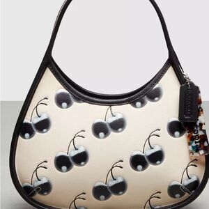 Coach cherry goth looking clutch bag